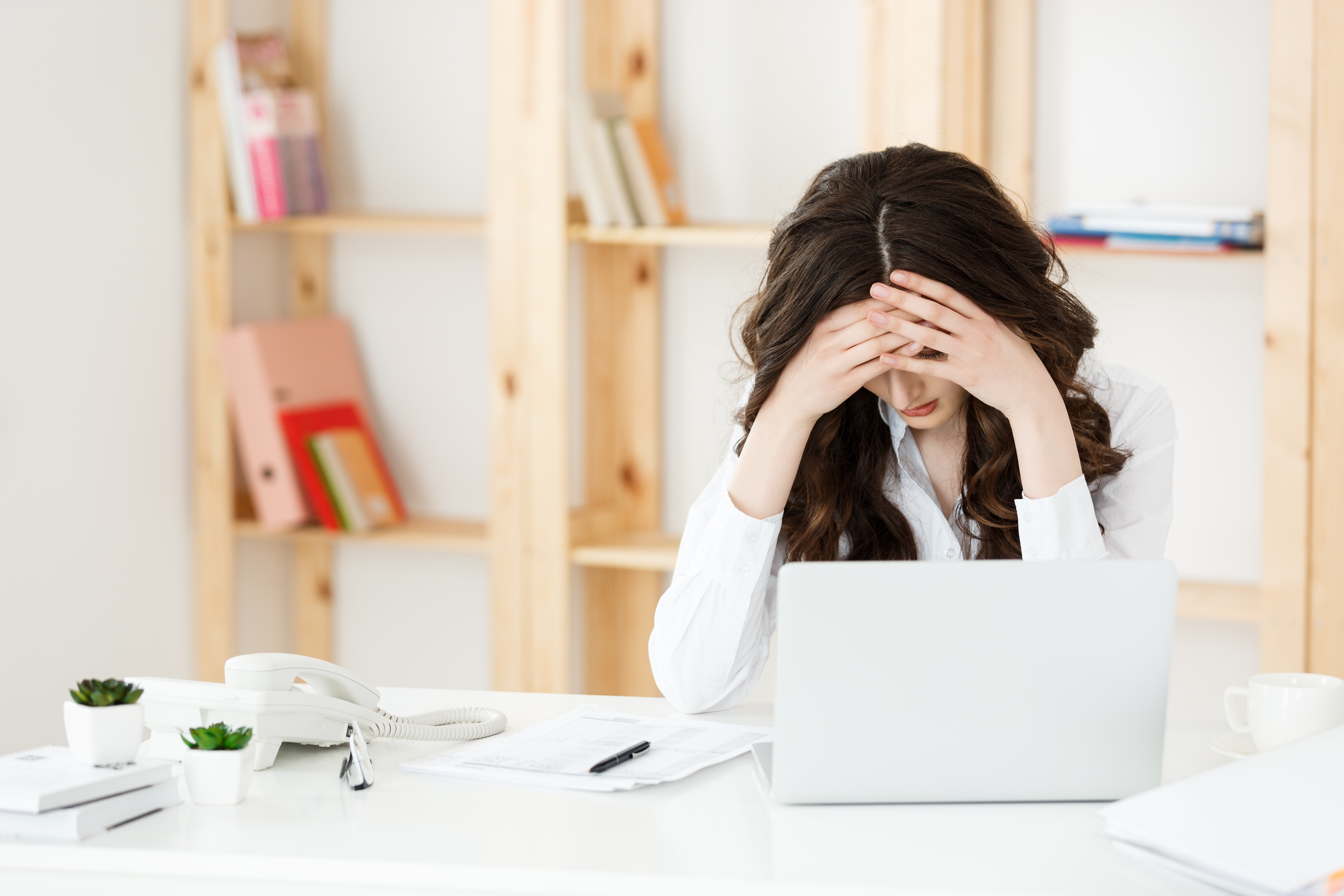 tired-young-businesswoman-suffering-from-long-time-sitting-computer-desk-office