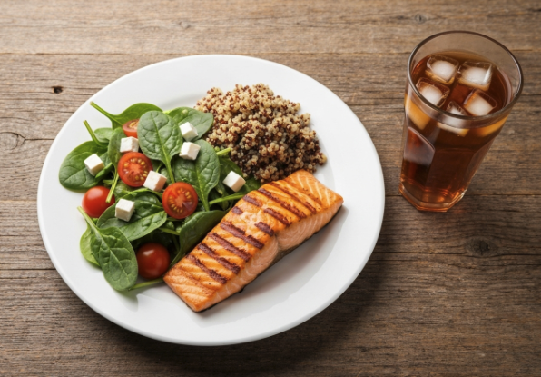 A healthy meal with high protein and low fat, including salmon and goat milk, to boost immunity against filiform warts.
